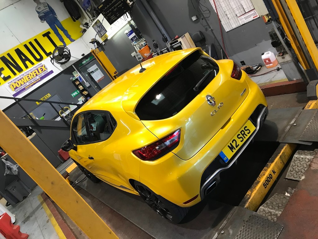 Renault Clio on the workshop ramp